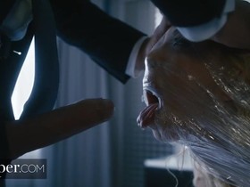 Blonde haired bimbo gets covered in plastic and fucked hard